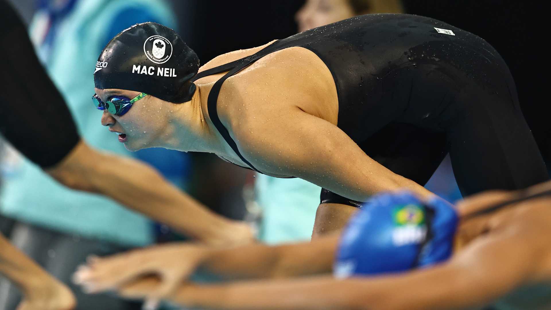 Canadian McNeil qualifies fourth for the 100m butterfly final