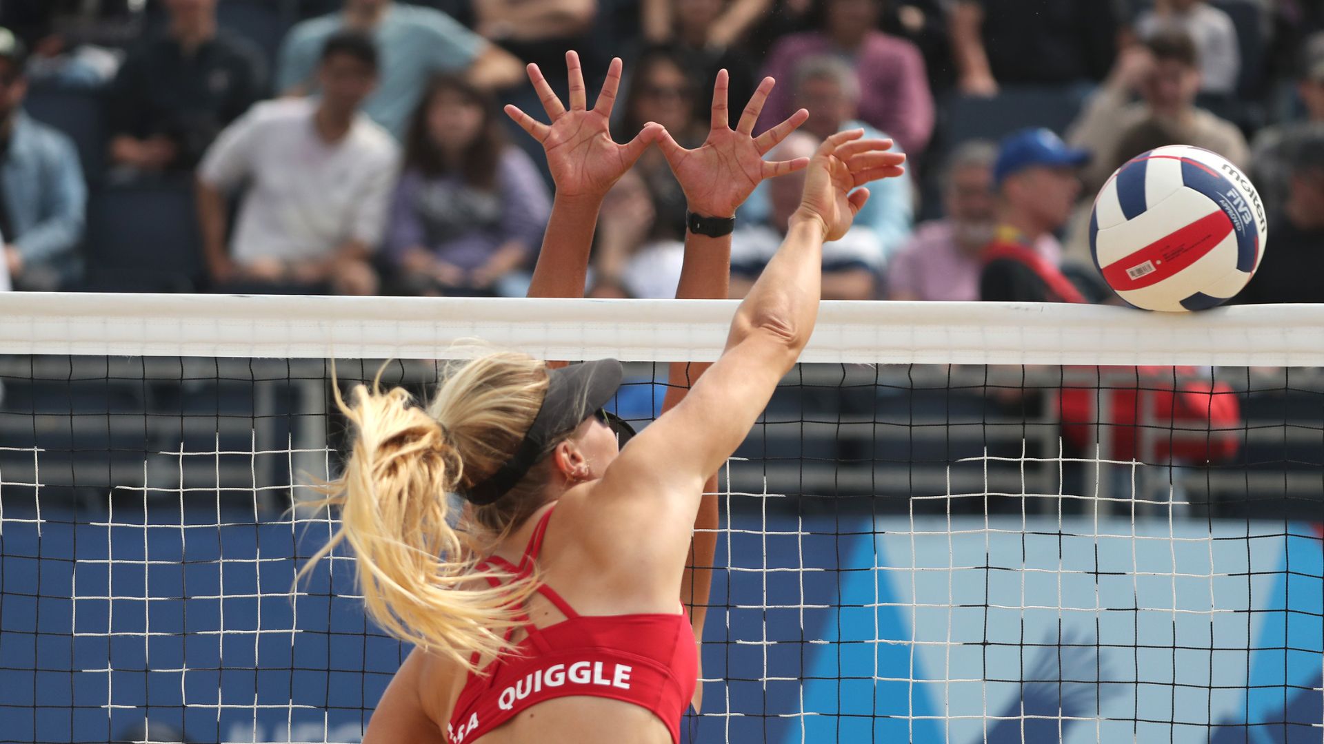 A strong entry in female's beach volleyball with Americans Quiggle and Murph